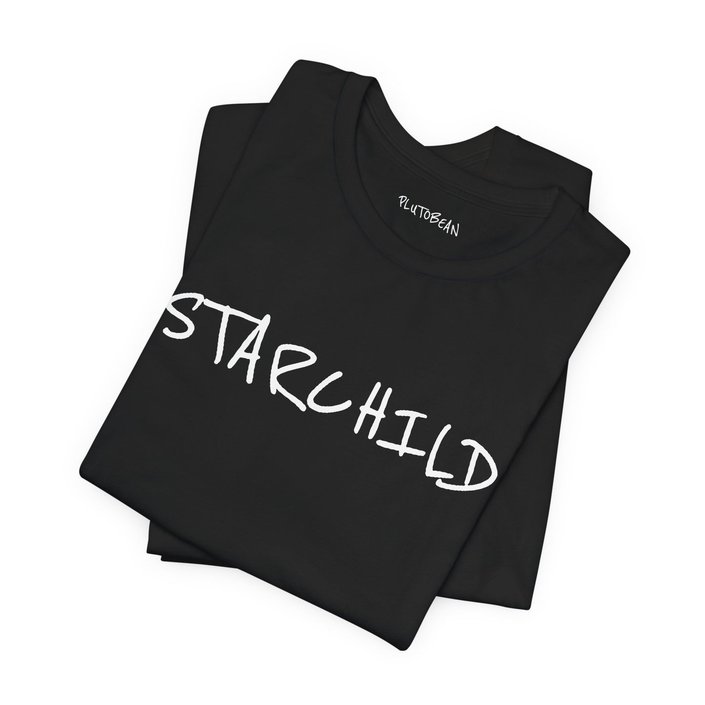 Folded black tee with handwritten white “STARCHILD” design
