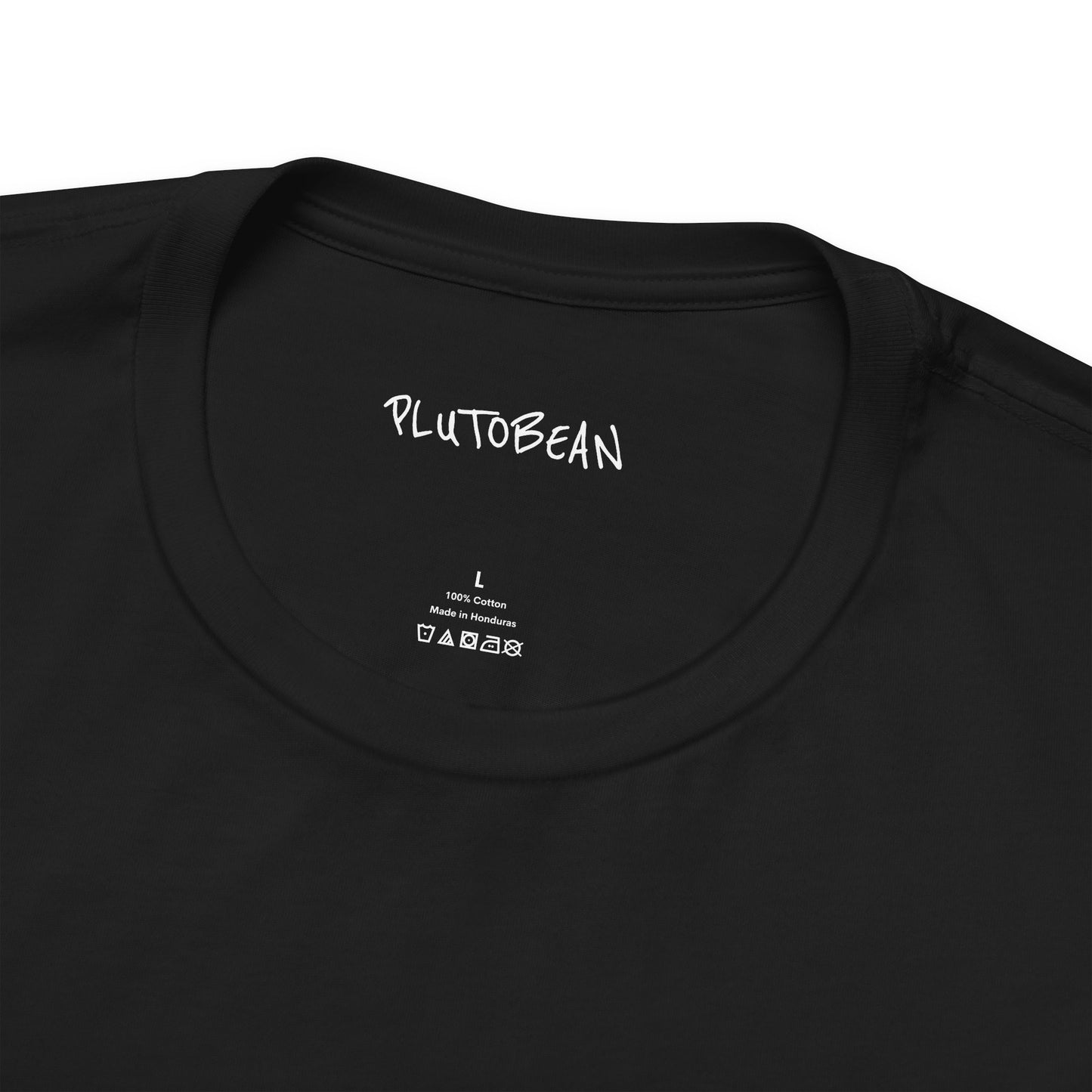Close-up of neckline and tag on STARCHILD black tee with white graphic